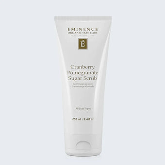 Eminence Organics Cranberry Pomegranate Sugar Scrub  on light blue background
