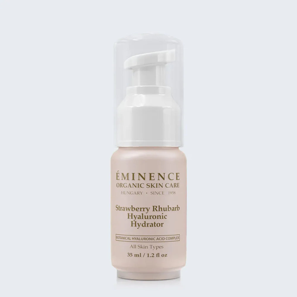 Eminence Organics Strawberry Rhubarb Hyaluronic Hydrator on light blue background