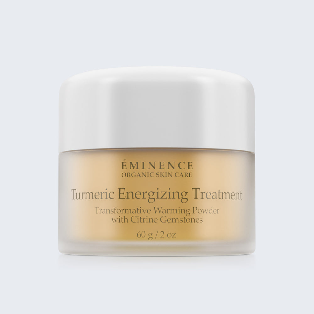 Eminence Organics Turmeric Energizing Treatment on blue background