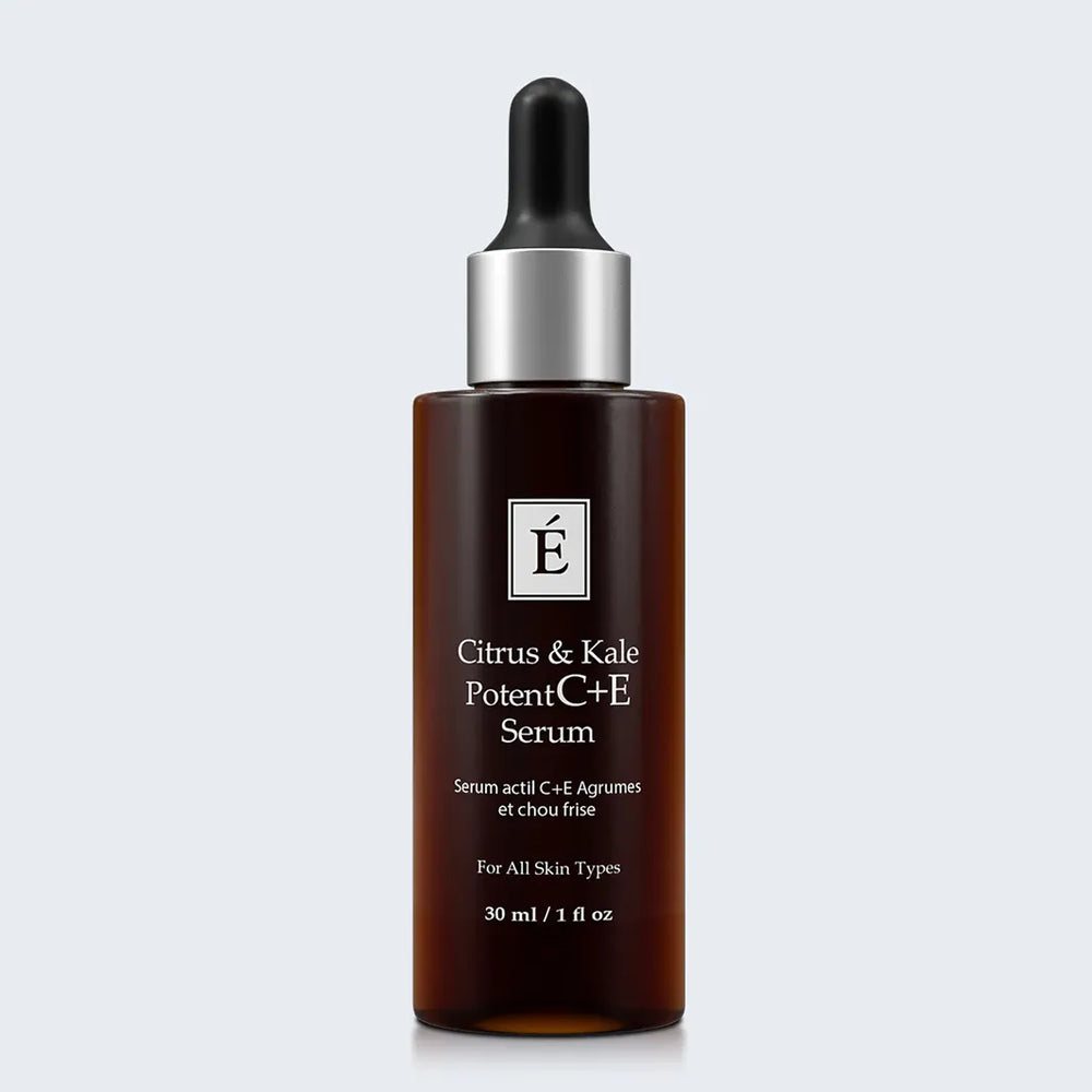 Eminence Organics Citrus & Kale Potent C+E Serum on light blue background