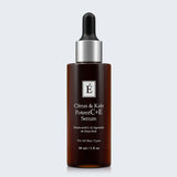 Eminence Organics Citrus & Kale Potent C+E Serum on light blue background