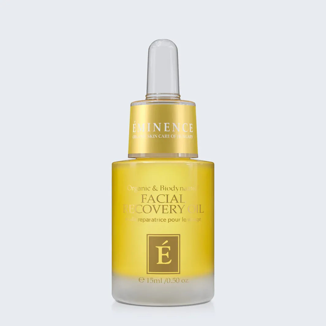 Eminence Organics Facial Recovery Oil on light blue background