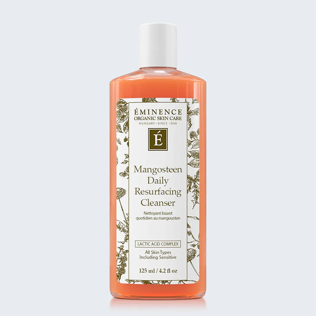 Eminence Organics Mangosteen Daily Resurfacing Cleanser on light blue background