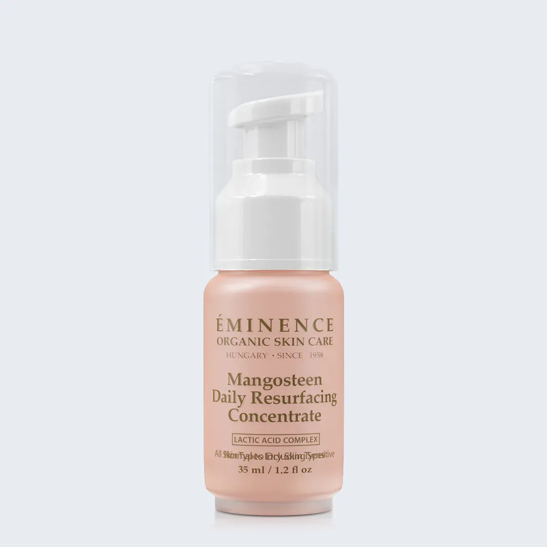 Eminence Organics Mangosteen Daily Resurfacing Concentrate on light blue background