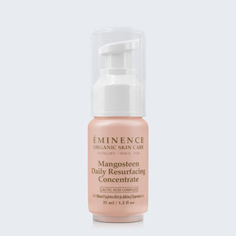 Eminence Organics Mangosteen Daily Resurfacing Concentrate on light blue background