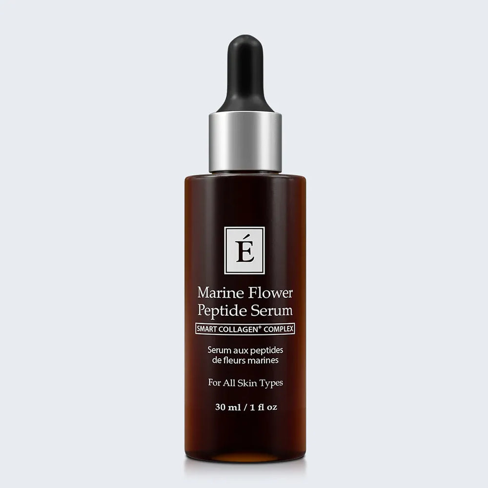 Eminence Organics Marine Flower Peptide Serum on light blue background