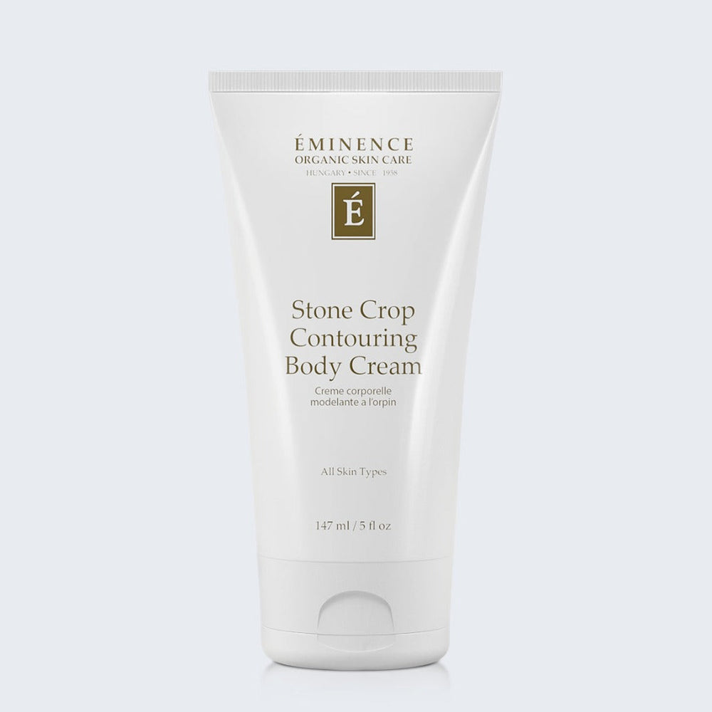 Eminence Organics Stone Crop Contouring Body Cream on light blue background