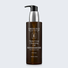 Eminence Organics Stone Crop Cleansing Oil on light blue background